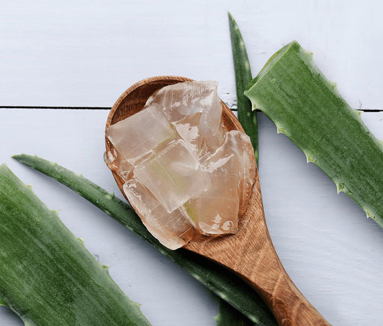 Aloe Vera jelly on a spoon - Aloe Vera is an ingredient in BeSilken Body Balm Stick & BeLoved Belly Sheet Mask